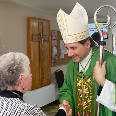 Archbishop Leo Greeting the Faithful