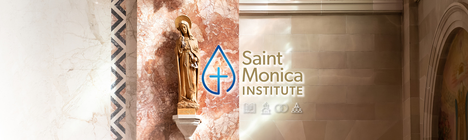 A statue on a Chapel wall, with the Institute's logo