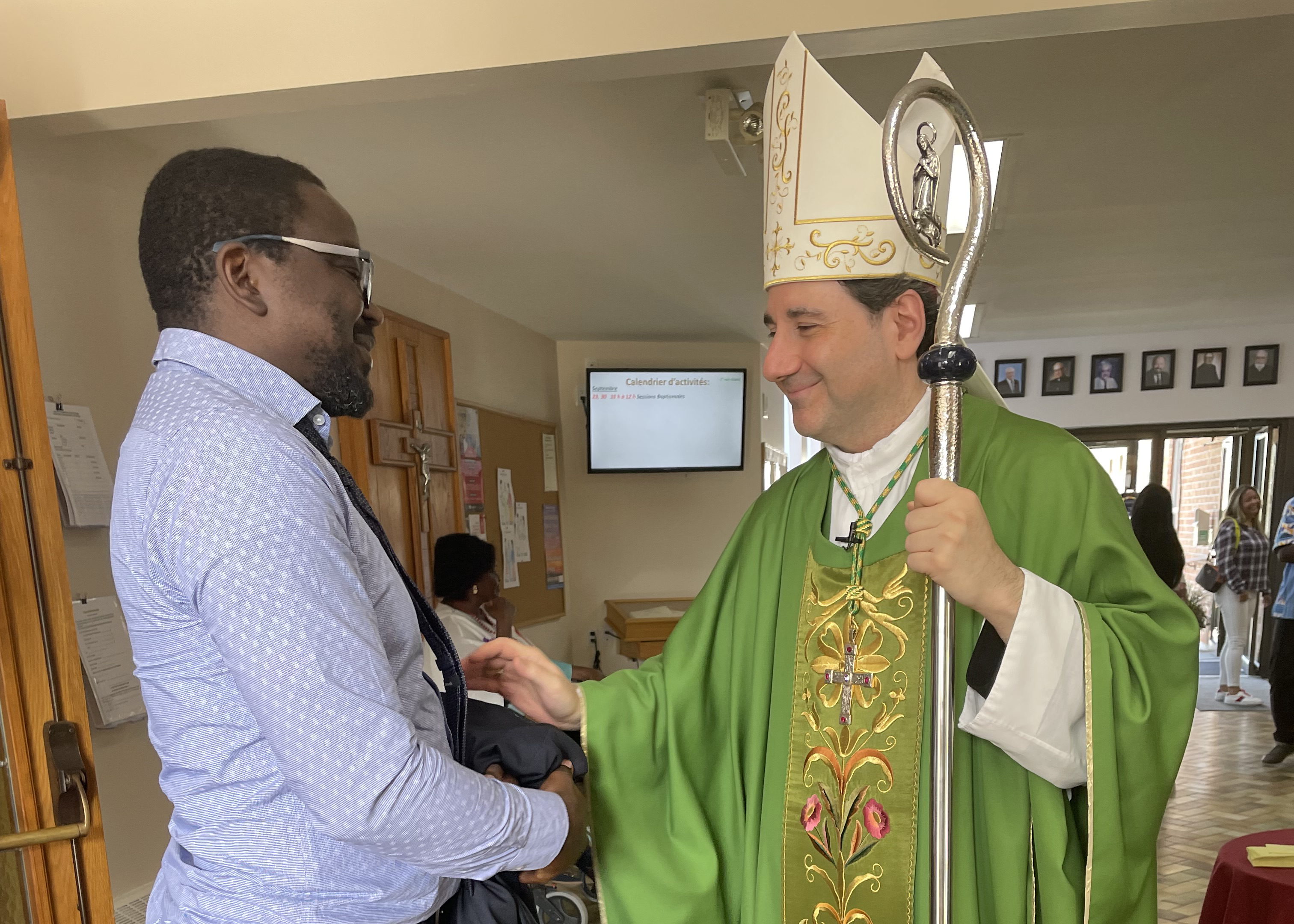 Archbishop Leo greats the faithful