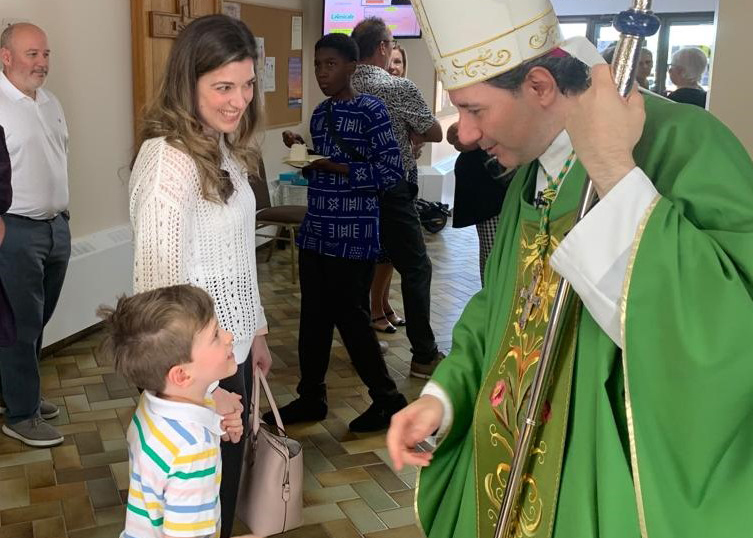 Archbishop Leo greats the faithful