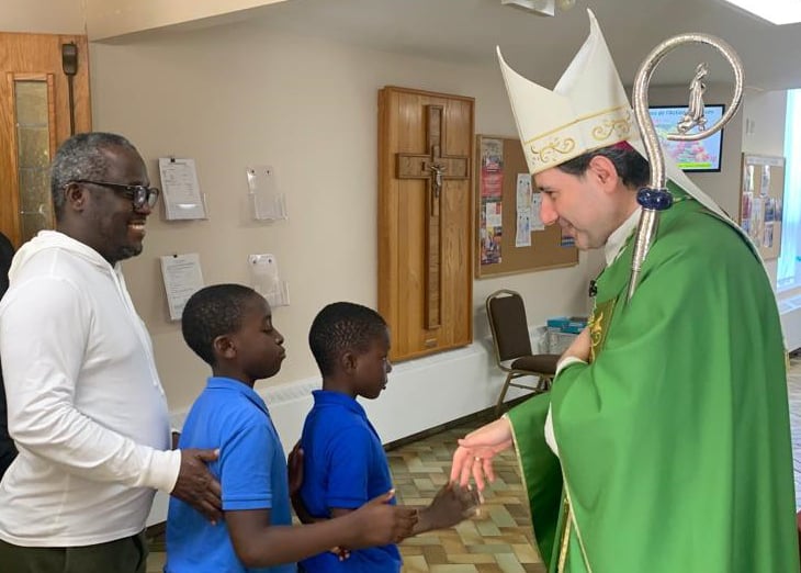 Archbishop Leo greats the faithful