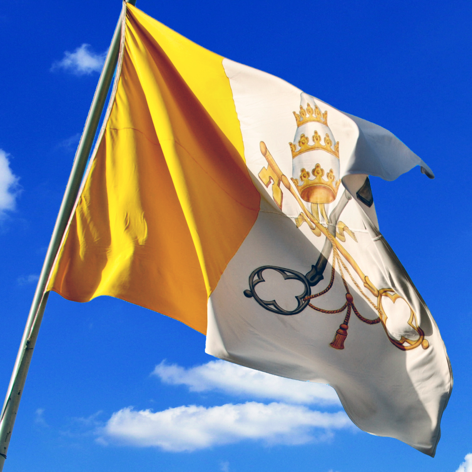 Flag of the Vatican flying in the air