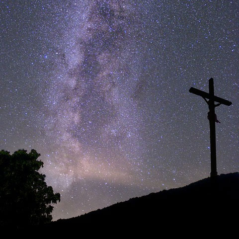 Crucifix by the night sky