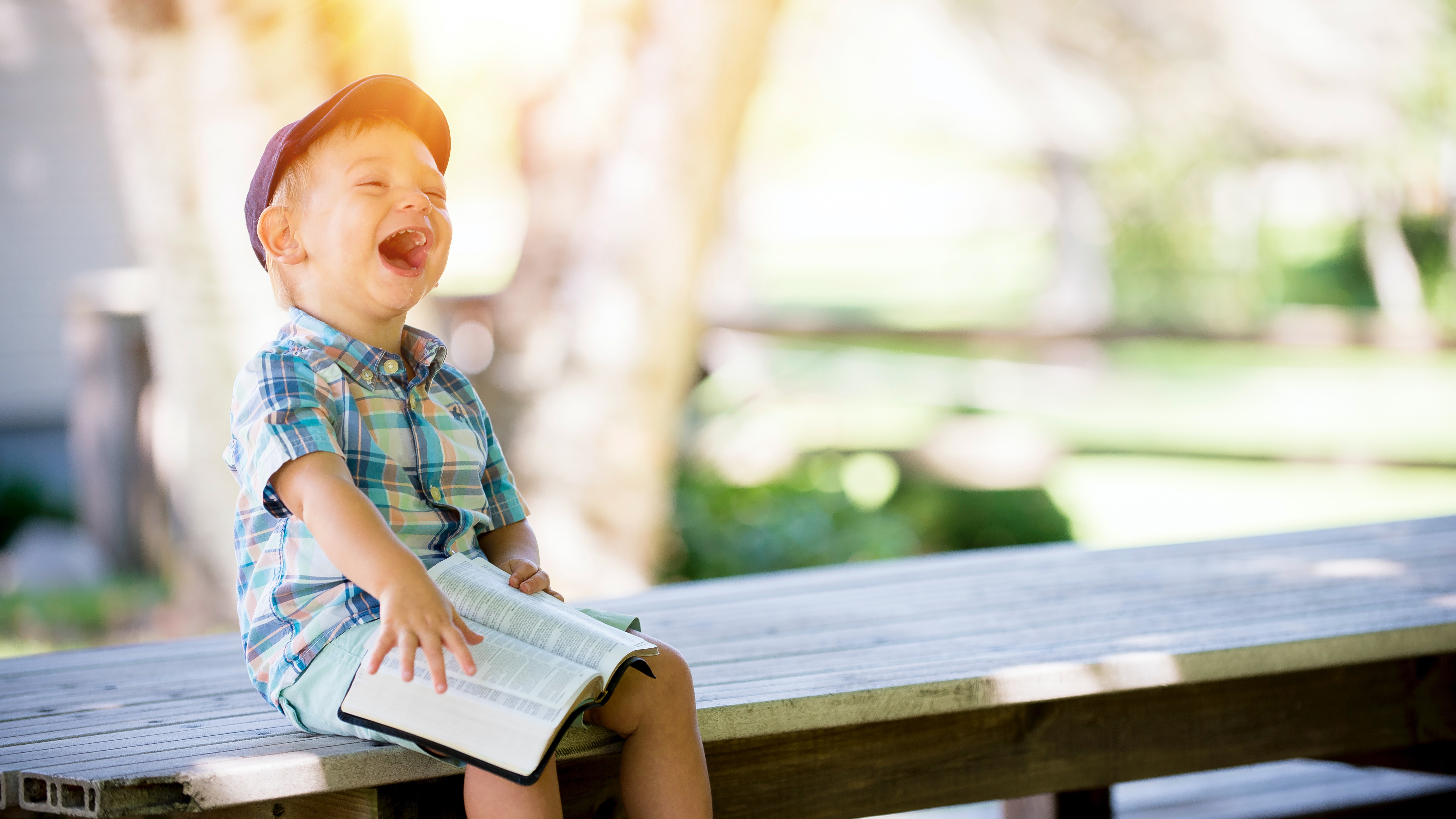 Kid sitting on bench