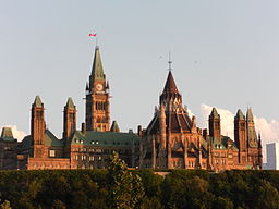 The exterior of Parliament Hill in Ottawa at dusk