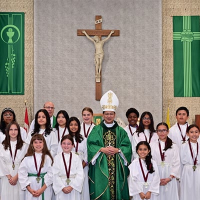 Altar servers with Bishop Nguyen