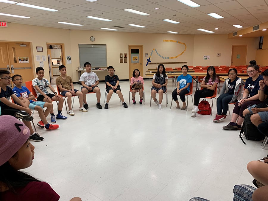 Youth group sitting around in a circle