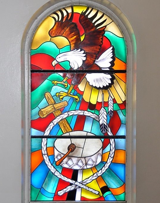 Native American imagery on stained glass window