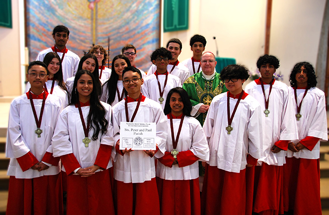 Bishop Camilleri with altar servers from Sts. Peter and Paul Parish