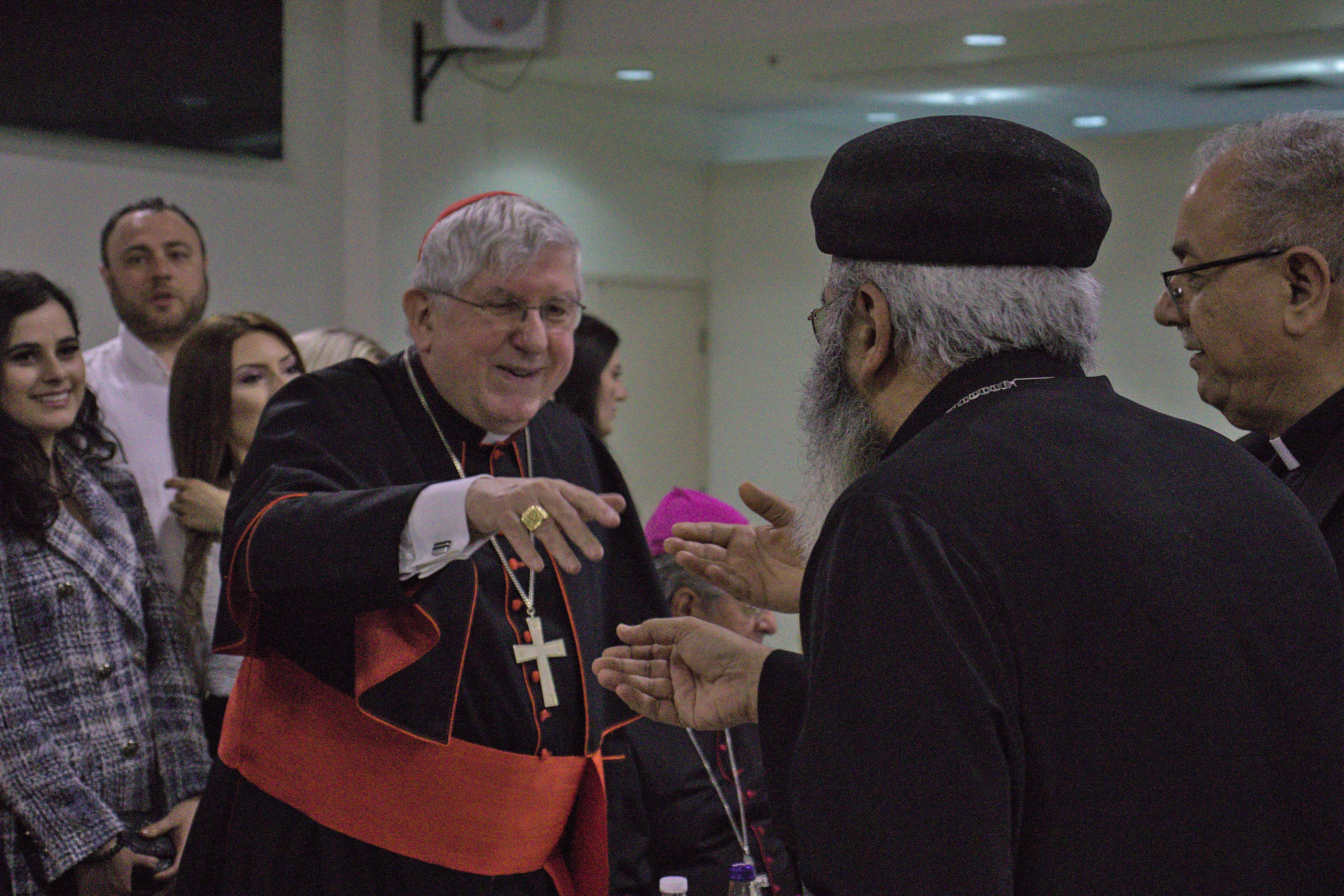 Photo of the Cardinal shaking hands