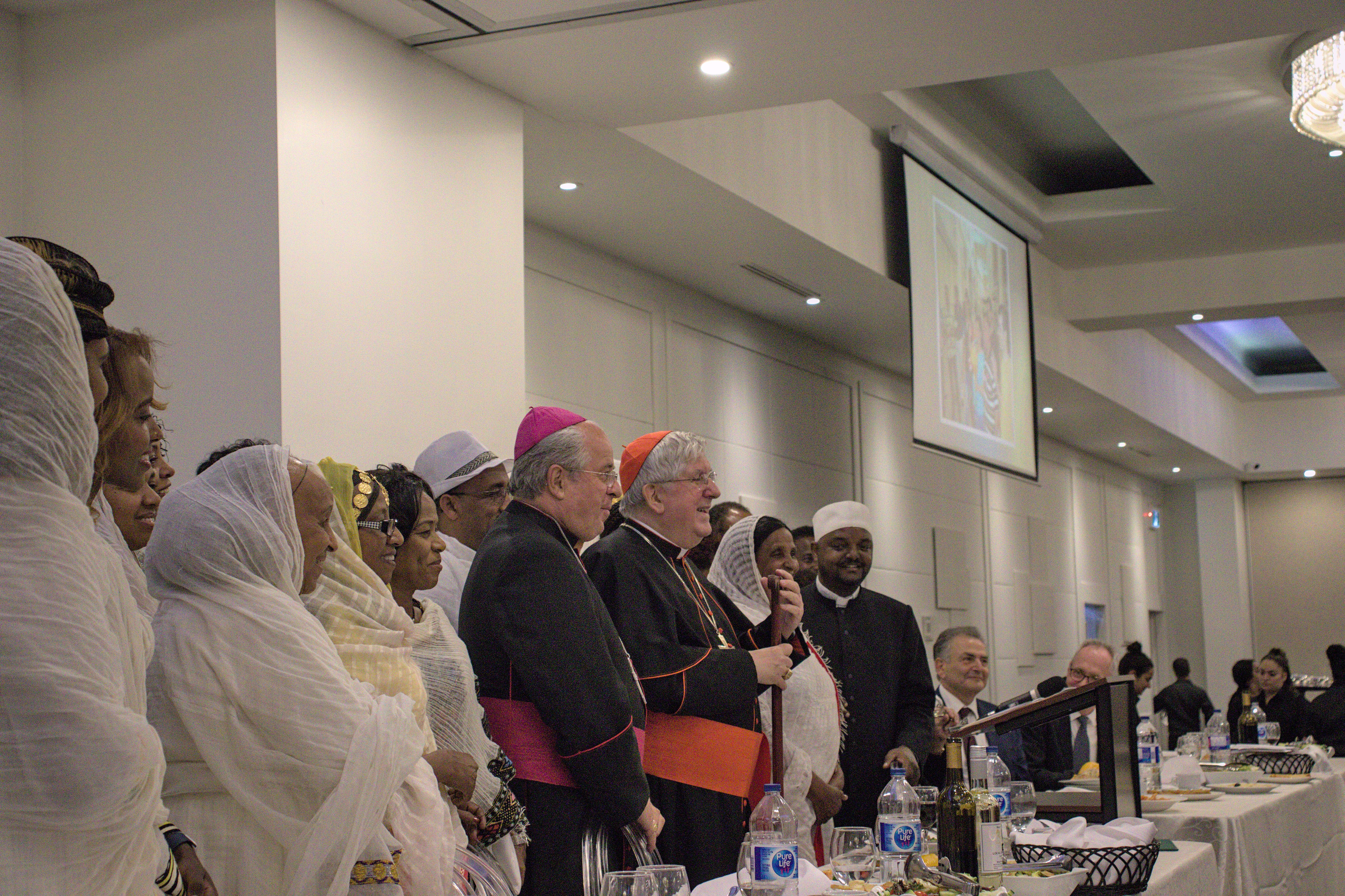 Cardinal Collins and the Papal Nuncio posting for a photo