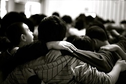 A group of teenage boys in a huddle