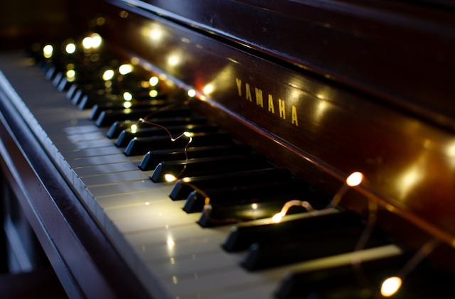 Piano decorated with string lights