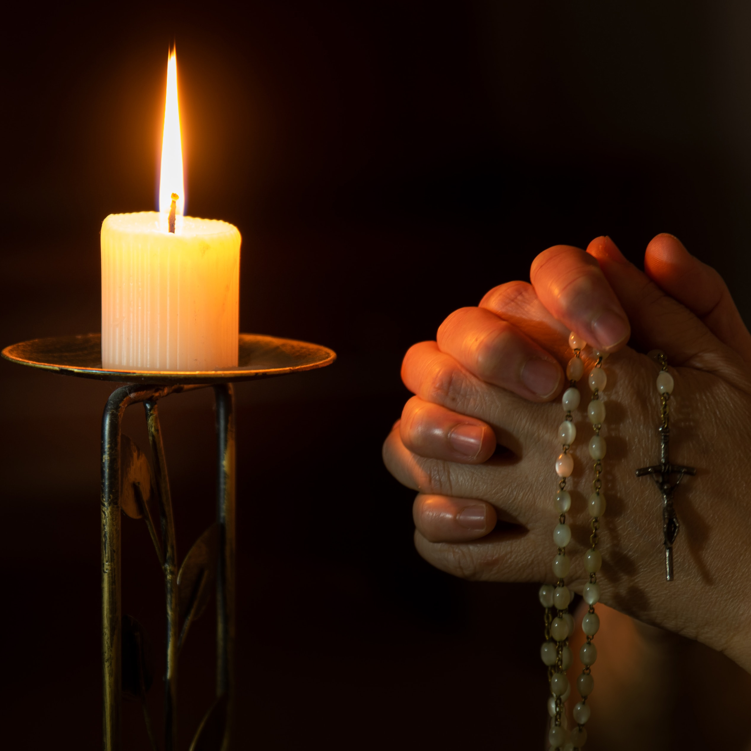 Candle and Prayer Hands