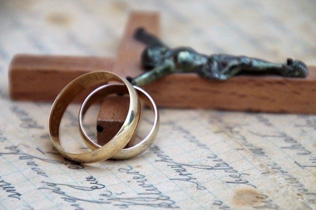 Wedding rings with crucifix