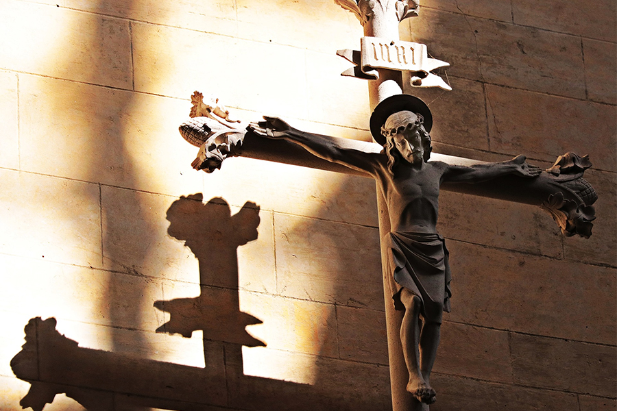 Crucifix in sun and shadows