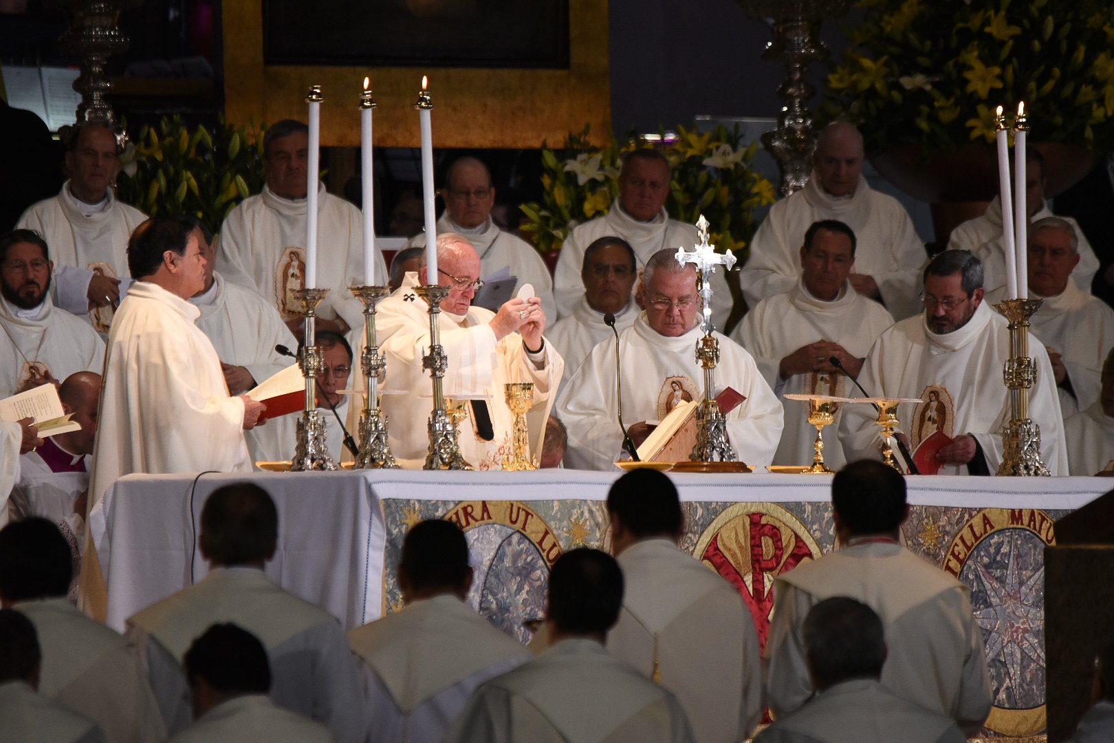 Pope Francis Holds Up the Eucharist while Celebrating Mass in Mexico