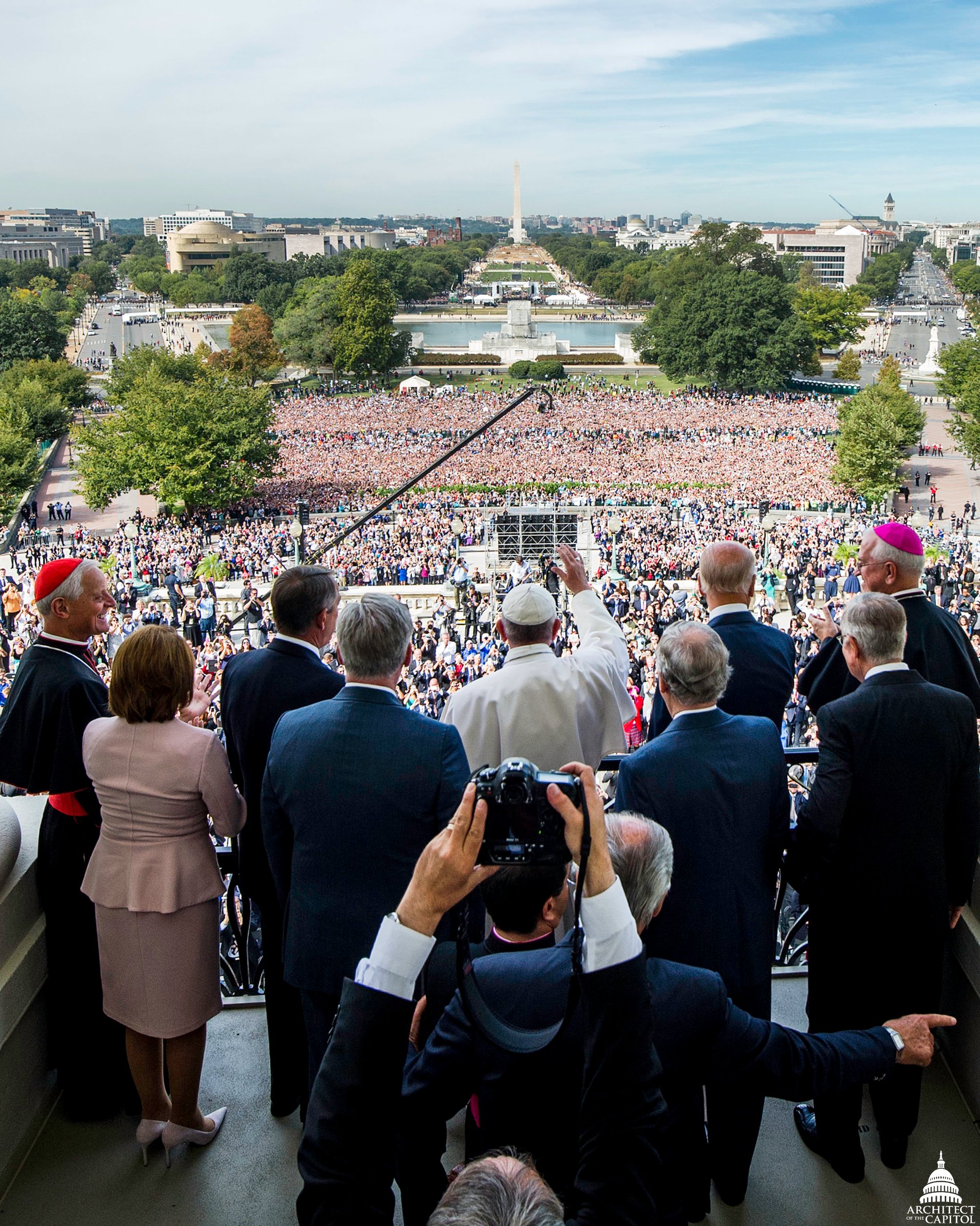 Pope Francis waves to a large crowd on the National Mall in Washington, D.C.