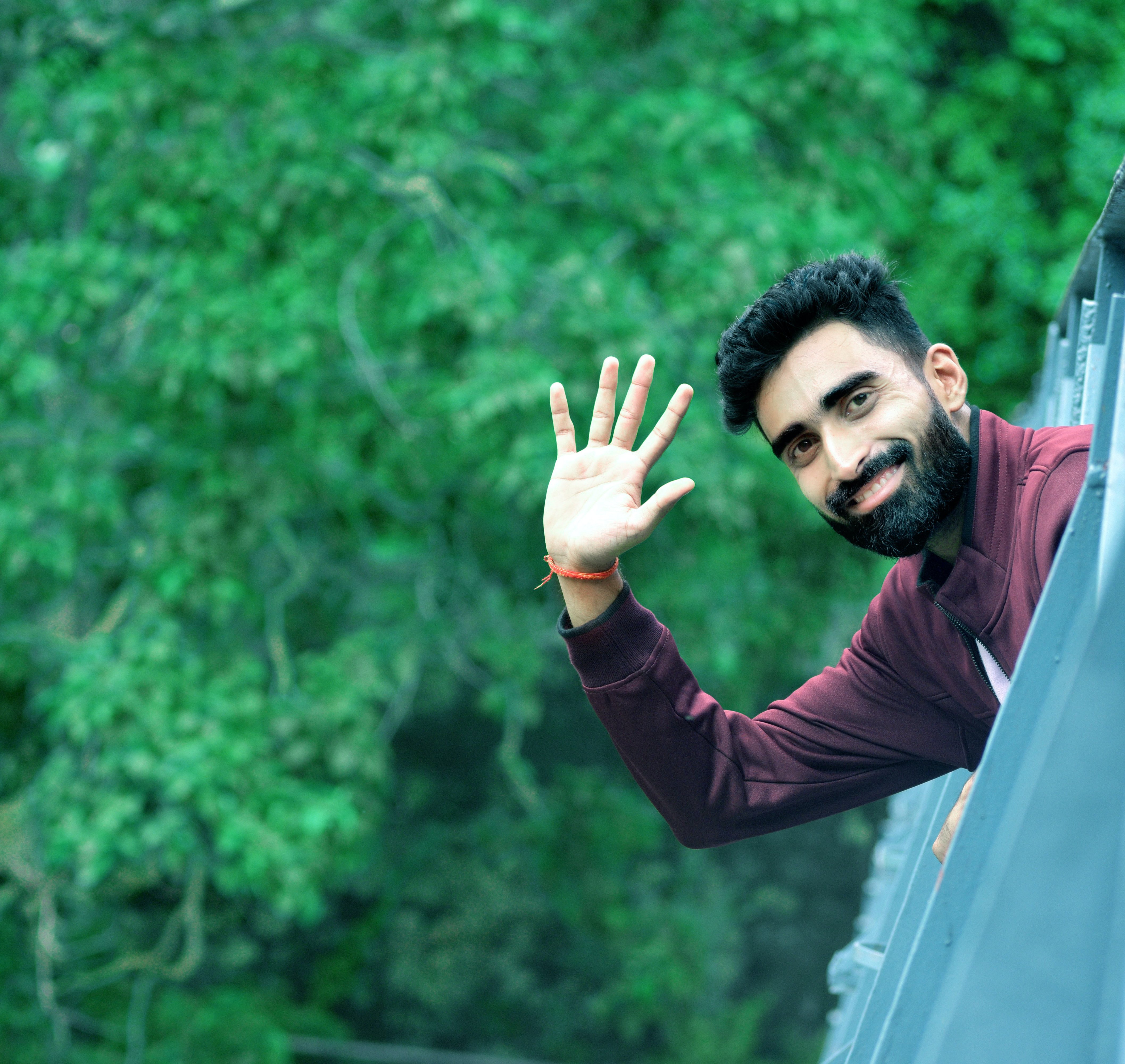 Man Waving from a train