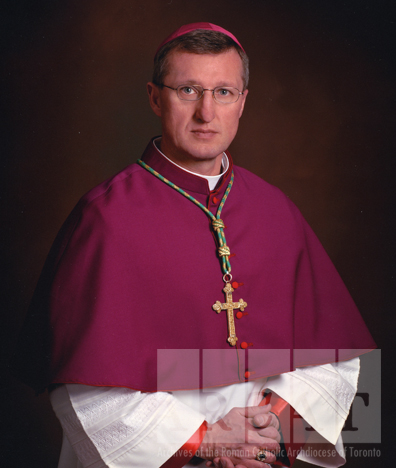 Portrait of Most Reverend Peter Joseph Hundt seated wearing episcopal dress.