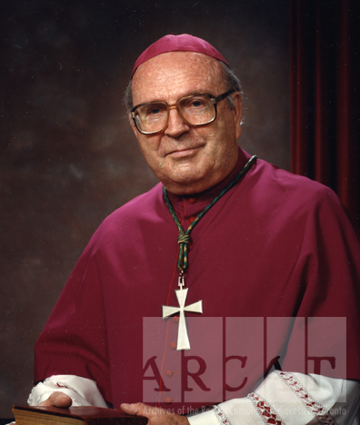 Portrait of Most Reverend Michael Pearse Lacey seated wearing episcopal dress.