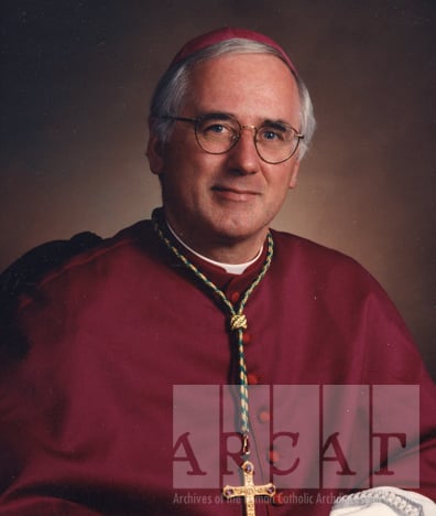 Portrait of Most Reverend Terrence Thomas Prendergast, S.J., seated wearing episcopal dress.