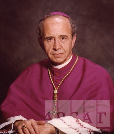 Portrait of Most Reverend Leonard James Wall seated wearing episcopal dress.