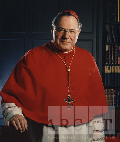 Portrait of His Eminence, Aloysius Matthew Cardinal Ambrozic standing in episcopal dress.