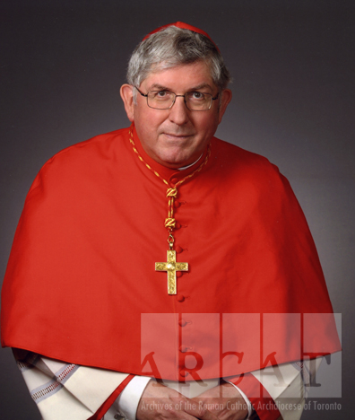 Colour portrait of His Eminence, Thomas Cardinal Collins, standing wearing red choir dress