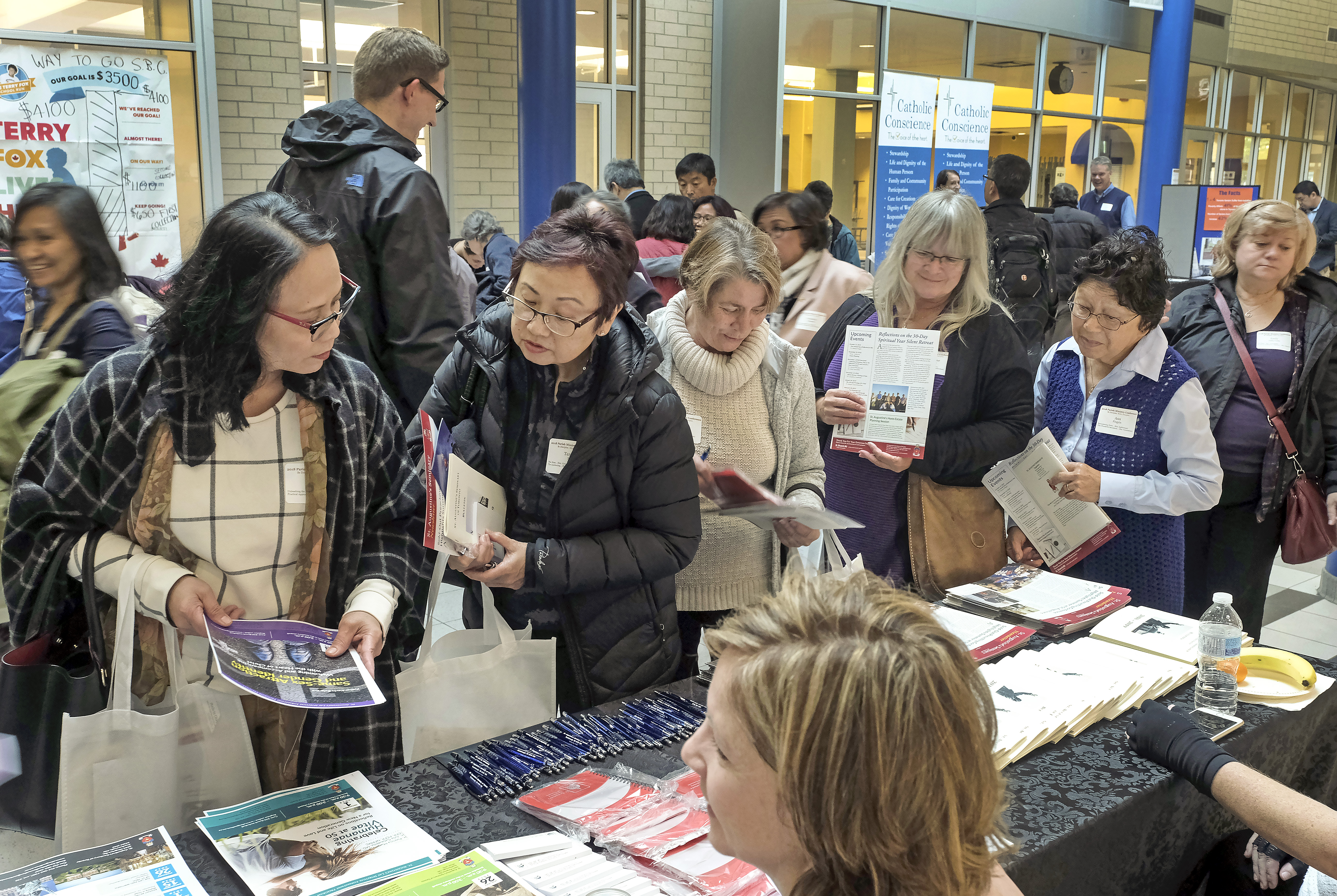 2018 Parish Ministry Conference exhibitor area with people surrounding the booths