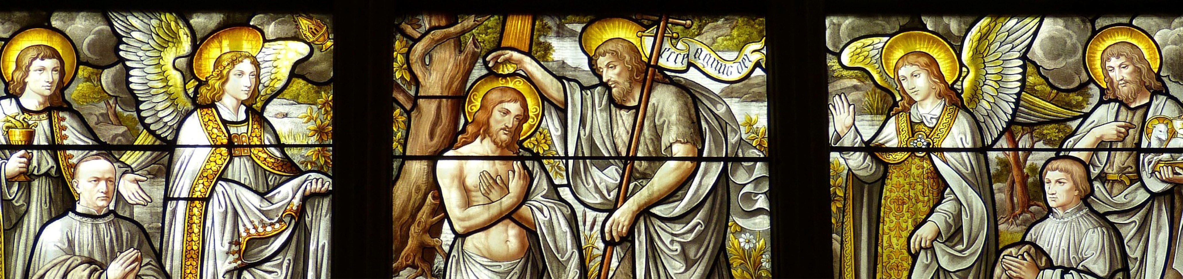 Stained glass window of the Baptism of Jesus