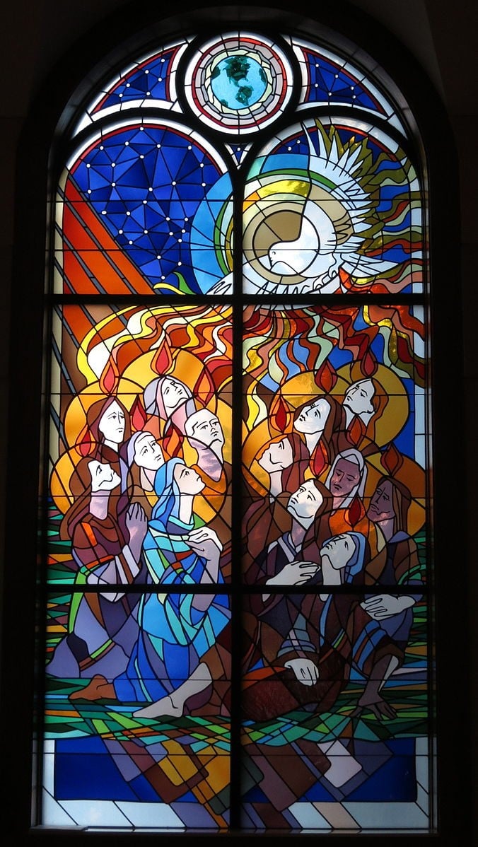 Nheyob,CC BY-SA 4.0,via wikimedia Commons- Our Lady of Perpetual Help Catholic Church (Grove City, Ohio) - stained glass, the Holy Spirit at Pentecost.jpg