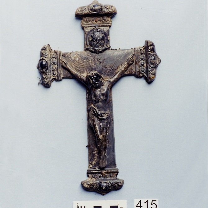 Metal coffin decoration with a crucifix