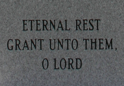 Memorial monument inscription reading "Eternal Rest Grant Unto Them, O Lord"