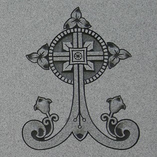 Memorial monument - Circled cross Memorial monument inscription of a circled cross with trillium flowers