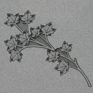 Memorial monument inscription of maple branches