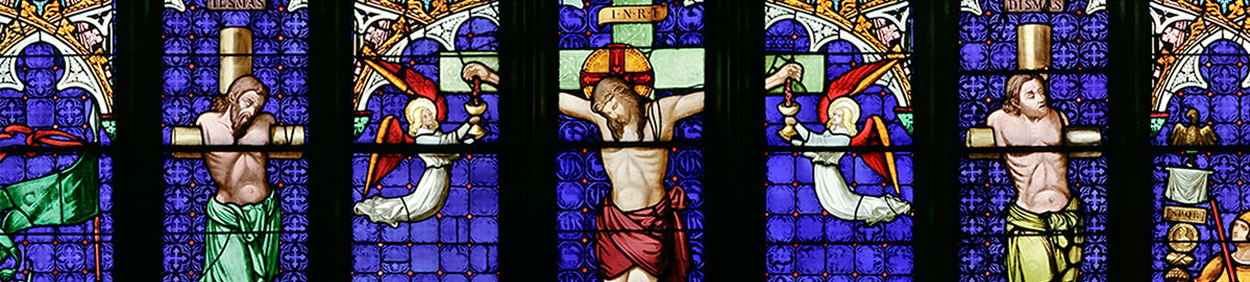 Stained glass window of Jesus on the Cross