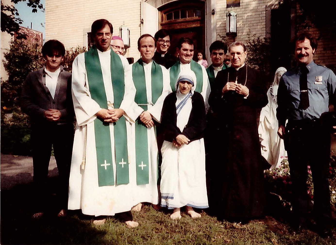 Group photo of Msgr. Sheehy with Mother Teresa