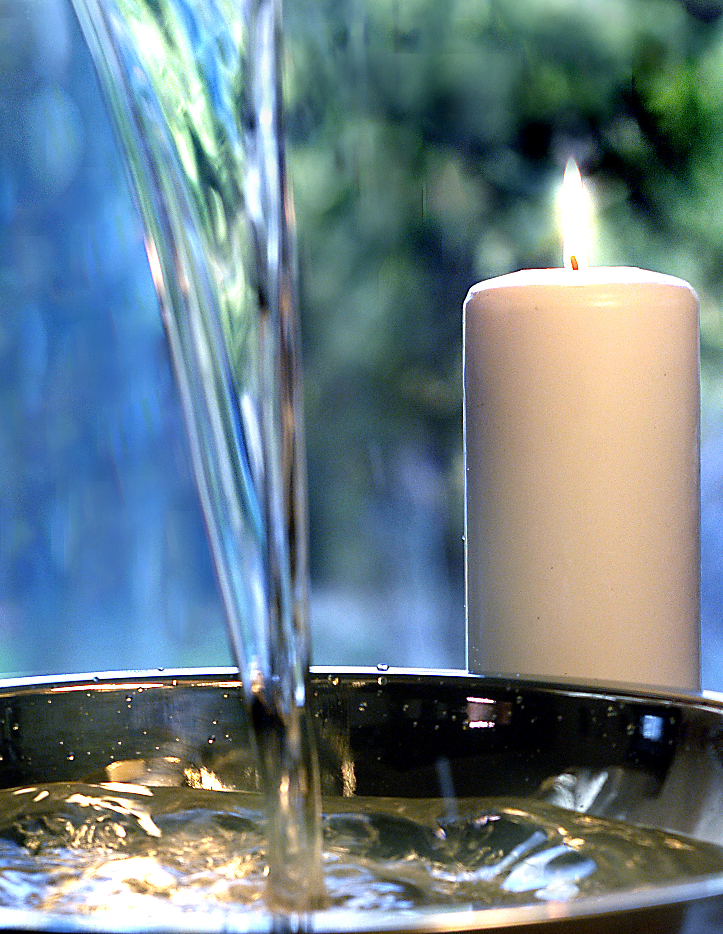 Candle with flowing water